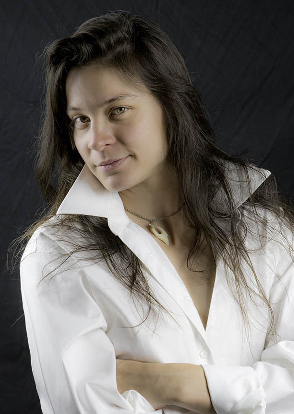 Brunette Studio model Green eyed brunette in MSHpics photo studio against a black background